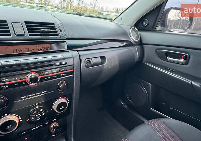 Черный Мазда 3, объемом двигателя 1.6 л и пробегом 247 тыс. км за 5550 $, фото 45 на Automoto.ua