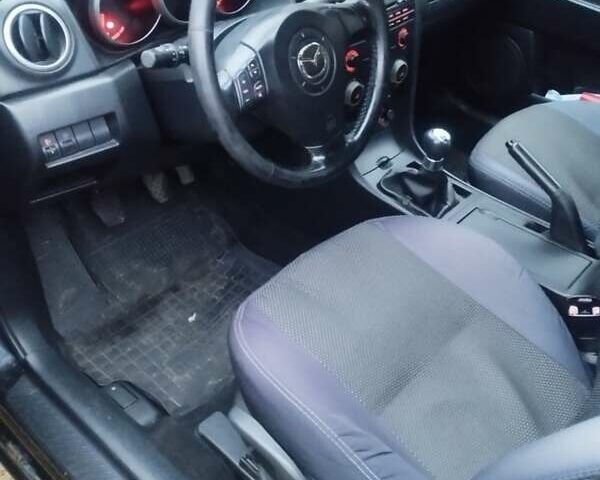 Черный Мазда 3, объемом двигателя 1.6 л и пробегом 243 тыс. км за 4499 $, фото 14 на Automoto.ua