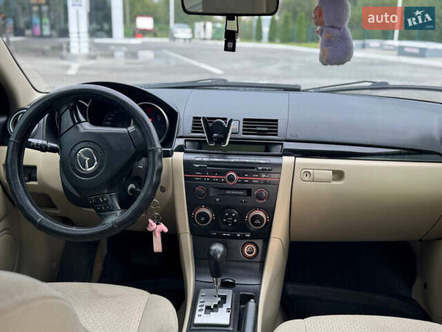 Чорний Мазда 3, об'ємом двигуна 1.6 л та пробігом 231 тис. км за 3650 $, фото 13 на Automoto.ua