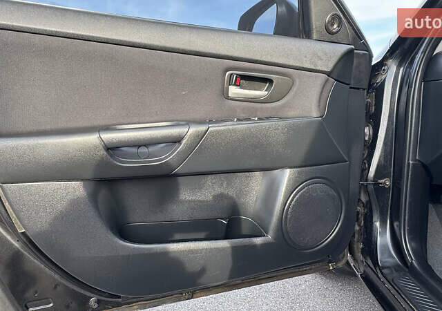 Чорний Мазда 3, об'ємом двигуна 1.6 л та пробігом 237 тис. км за 5850 $, фото 35 на Automoto.ua
