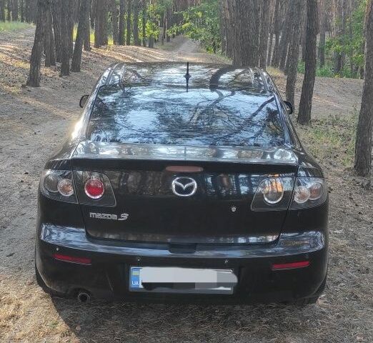 Черный Мазда 3, объемом двигателя 1.6 л и пробегом 173 тыс. км за 5000 $, фото 4 на Automoto.ua