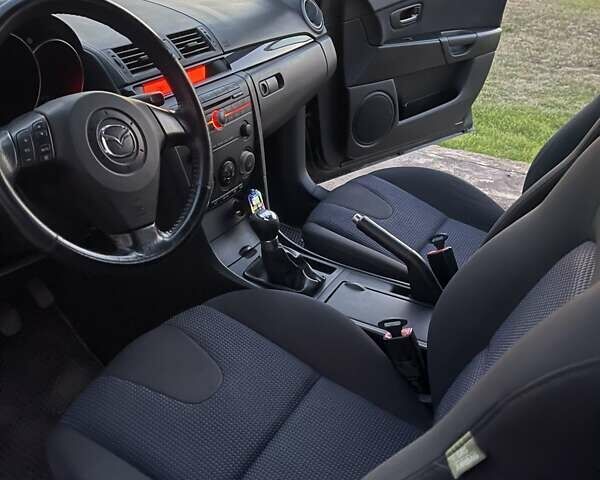 Черный Мазда 3, объемом двигателя 1.6 л и пробегом 173 тыс. км за 6300 $, фото 7 на Automoto.ua