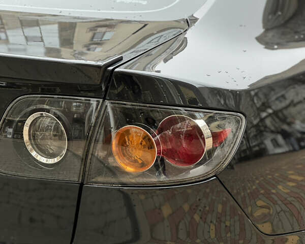 Черный Мазда 3, объемом двигателя 1.6 л и пробегом 192 тыс. км за 5500 $, фото 39 на Automoto.ua