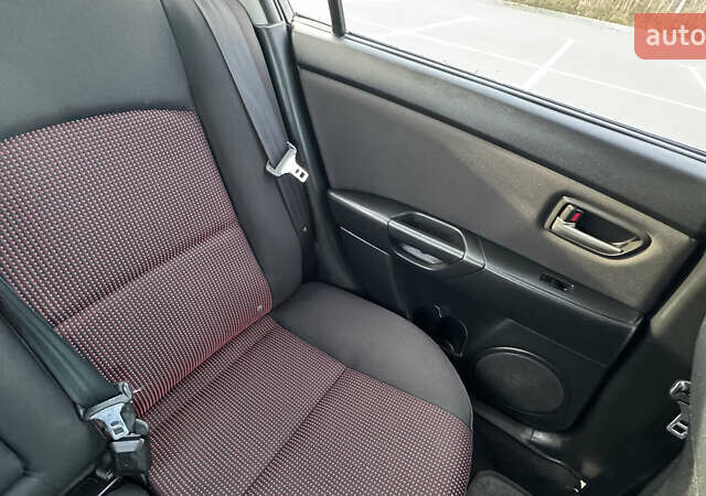 Чорний Мазда 3, об'ємом двигуна 1.6 л та пробігом 237 тис. км за 5850 $, фото 48 на Automoto.ua