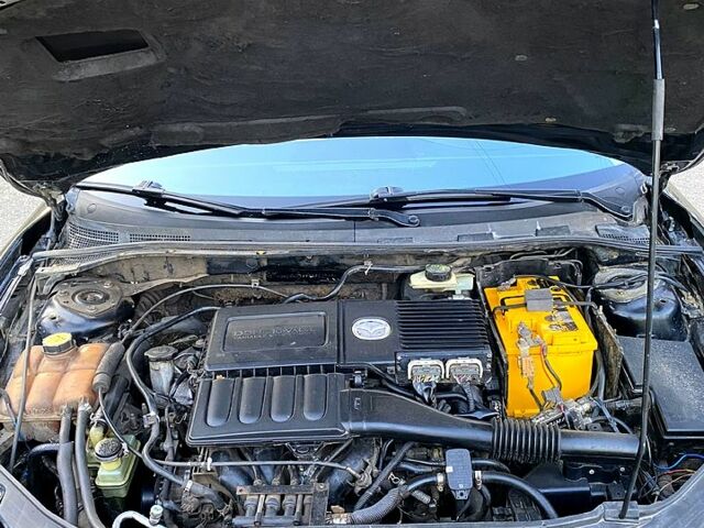 Черный Мазда 3, объемом двигателя 1.6 л и пробегом 300 тыс. км за 4800 $, фото 7 на Automoto.ua