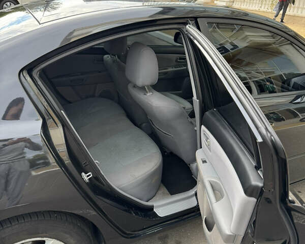 Черный Мазда 3, объемом двигателя 1.6 л и пробегом 312 тыс. км за 4700 $, фото 5 на Automoto.ua