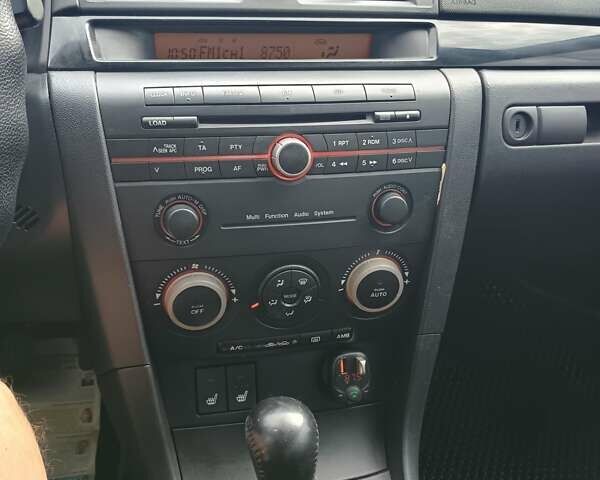 Чорний Мазда 3, об'ємом двигуна 1.6 л та пробігом 262 тис. км за 5100 $, фото 4 на Automoto.ua