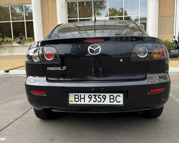 Черный Мазда 3, объемом двигателя 1.6 л и пробегом 312 тыс. км за 4700 $, фото 6 на Automoto.ua