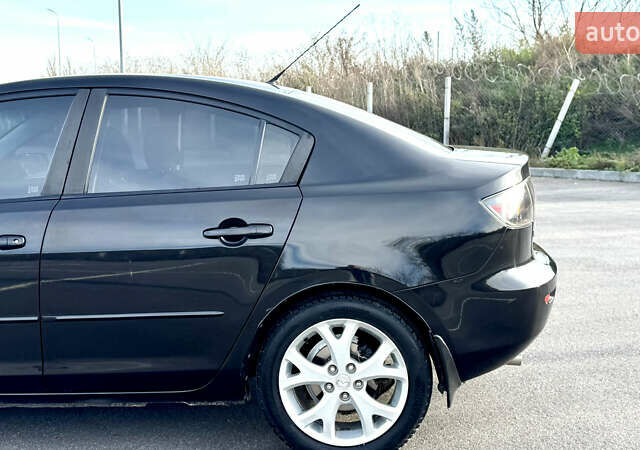 Чорний Мазда 3, об'ємом двигуна 1.6 л та пробігом 237 тис. км за 5850 $, фото 17 на Automoto.ua