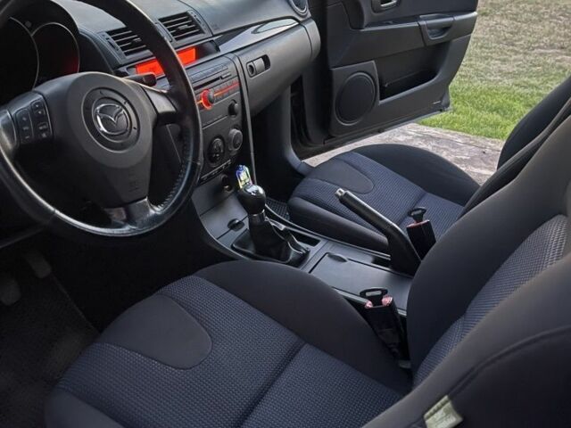 Черный Мазда 3, объемом двигателя 1.6 л и пробегом 173 тыс. км за 6100 $, фото 5 на Automoto.ua