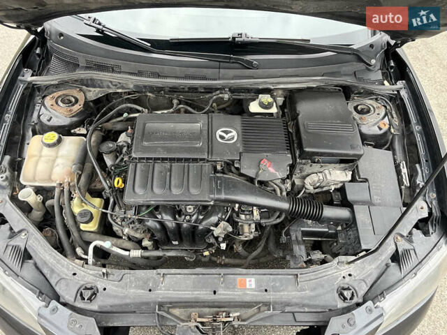 Чорний Мазда 3, об'ємом двигуна 1.6 л та пробігом 247 тис. км за 4600 $, фото 10 на Automoto.ua