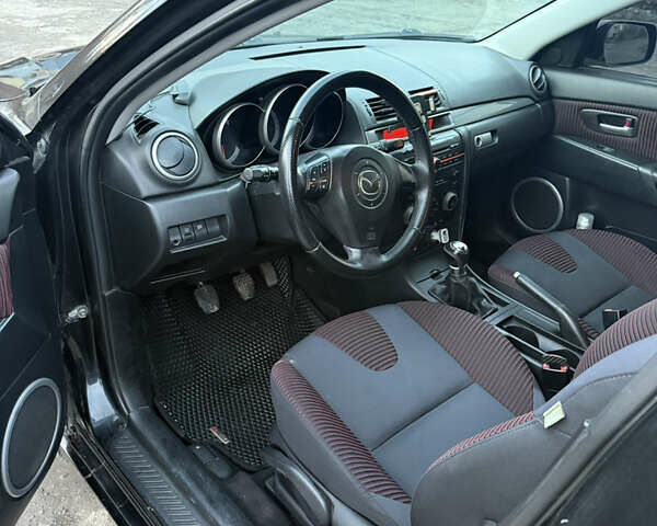 Черный Мазда 3, объемом двигателя 2 л и пробегом 260 тыс. км за 4950 $, фото 11 на Automoto.ua