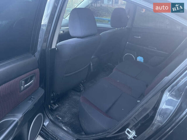 Чорний Мазда 3, об'ємом двигуна 2 л та пробігом 260 тис. км за 5100 $, фото 3 на Automoto.ua