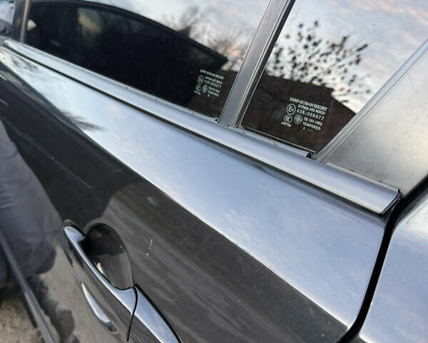 Черный Мазда 3, объемом двигателя 2 л и пробегом 260 тыс. км за 4950 $, фото 8 на Automoto.ua