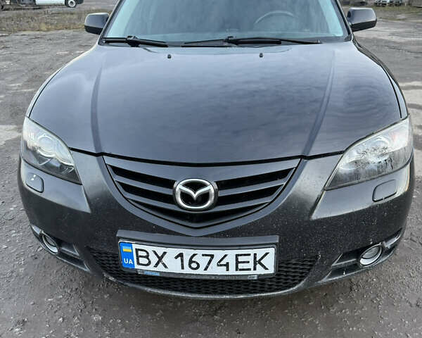 Черный Мазда 3, объемом двигателя 2 л и пробегом 260 тыс. км за 4950 $, фото 5 на Automoto.ua