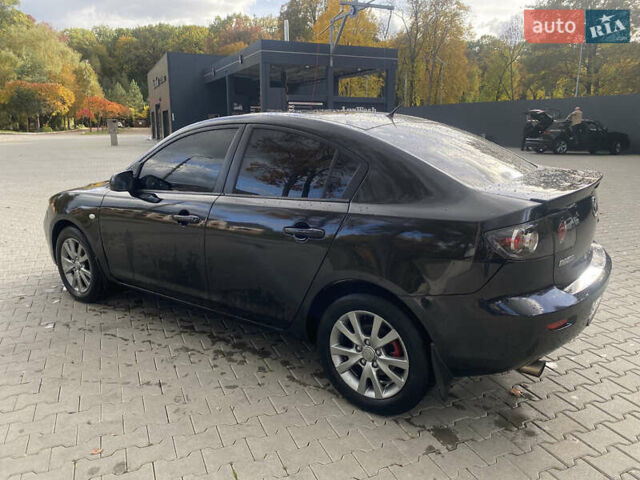 Чорний Мазда 3, об'ємом двигуна 1.6 л та пробігом 203 тис. км за 4350 $, фото 1 на Automoto.ua