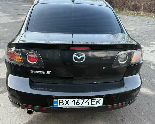 Черный Мазда 3, объемом двигателя 2 л и пробегом 260 тыс. км за 4950 $, фото 2 на Automoto.ua