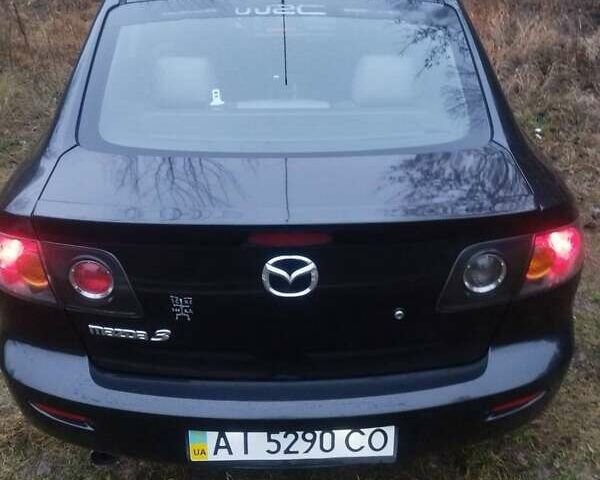 Черный Мазда 3, объемом двигателя 1.6 л и пробегом 243 тыс. км за 4499 $, фото 10 на Automoto.ua