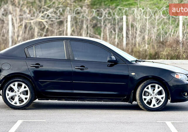 Чорний Мазда 3, об'ємом двигуна 1.6 л та пробігом 237 тис. км за 5850 $, фото 25 на Automoto.ua