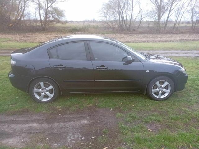 Чорний Мазда 3, об'ємом двигуна 2 л та пробігом 360 тис. км за 4700 $, фото 6 на Automoto.ua