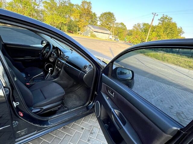 Чорний Мазда 3, об'ємом двигуна 2 л та пробігом 259 тис. км за 6000 $, фото 9 на Automoto.ua