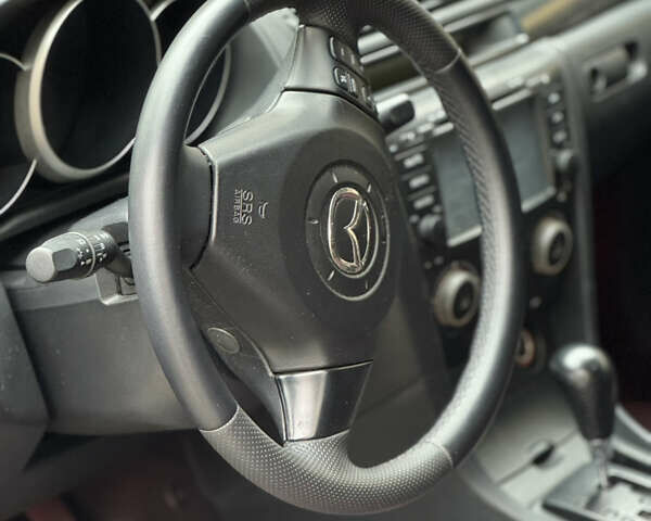 Черный Мазда 3, объемом двигателя 1.6 л и пробегом 192 тыс. км за 5500 $, фото 14 на Automoto.ua