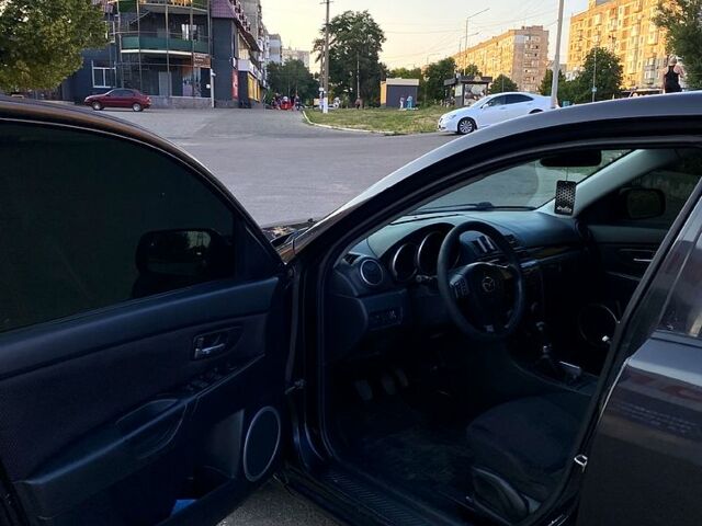 Черный Мазда 3, объемом двигателя 1.6 л и пробегом 300 тыс. км за 4800 $, фото 4 на Automoto.ua