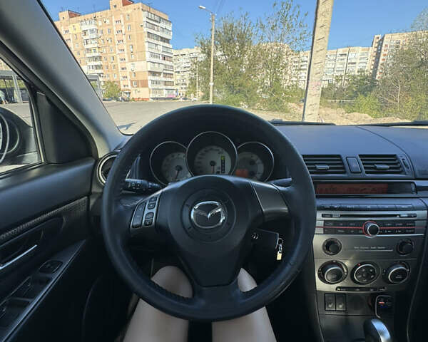 Черный Мазда 3, объемом двигателя 1.6 л и пробегом 200 тыс. км за 5900 $, фото 9 на Automoto.ua