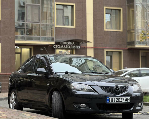 Черный Мазда 3, объемом двигателя 1.6 л и пробегом 192 тыс. км за 5500 $, фото 1 на Automoto.ua