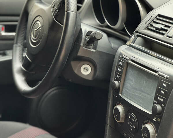 Черный Мазда 3, объемом двигателя 1.6 л и пробегом 192 тыс. км за 5500 $, фото 6 на Automoto.ua