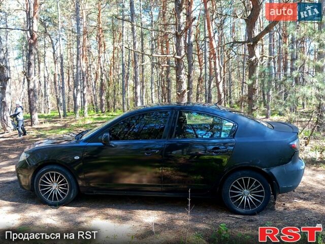 Черный Мазда 3, объемом двигателя 1.6 л и пробегом 257 тыс. км за 4000 $, фото 6 на Automoto.ua