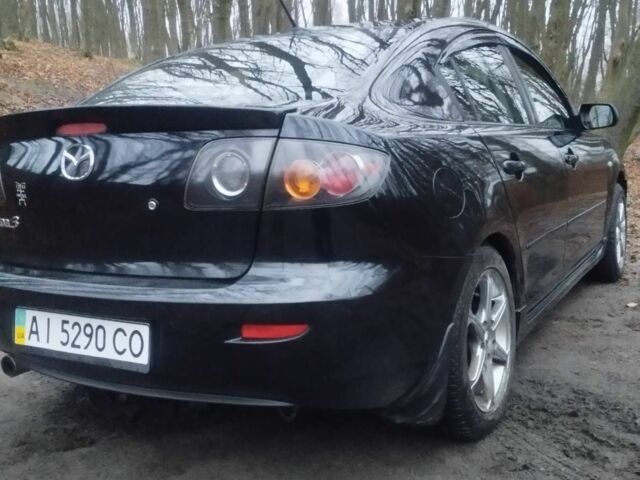 Черный Мазда 3, объемом двигателя 0 л и пробегом 243 тыс. км за 4499 $, фото 3 на Automoto.ua