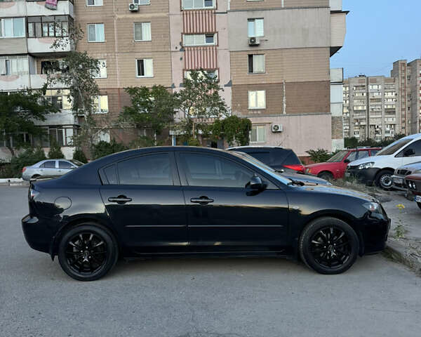 Черный Мазда 3, объемом двигателя 1.6 л и пробегом 200 тыс. км за 5900 $, фото 6 на Automoto.ua