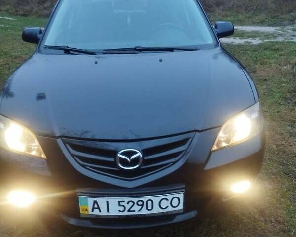 Черный Мазда 3, объемом двигателя 1.6 л и пробегом 243 тыс. км за 4499 $, фото 13 на Automoto.ua