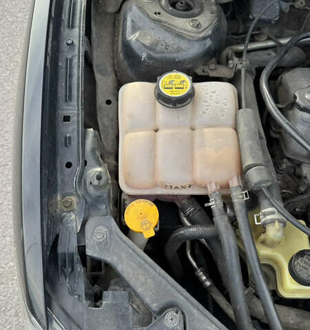 Черный Мазда 3, объемом двигателя 1.6 л и пробегом 247 тыс. км за 5550 $, фото 58 на Automoto.ua