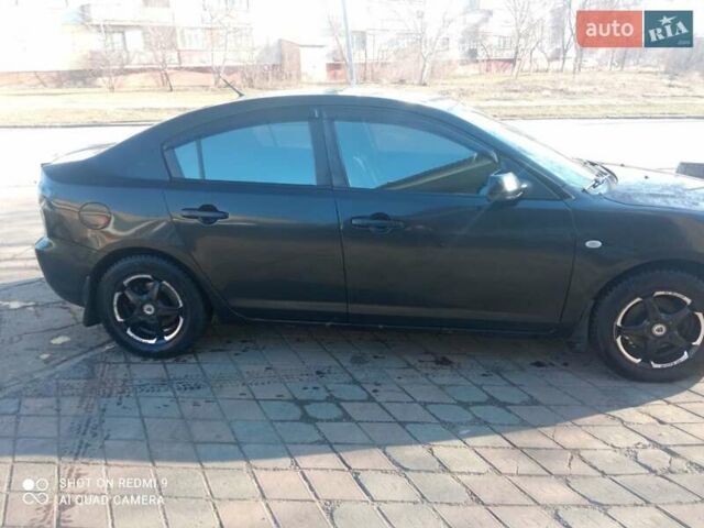 Черный Мазда 3, объемом двигателя 1.6 л и пробегом 280 тыс. км за 4500 $, фото 4 на Automoto.ua