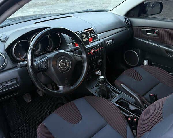 Черный Мазда 3, объемом двигателя 2 л и пробегом 260 тыс. км за 4950 $, фото 14 на Automoto.ua