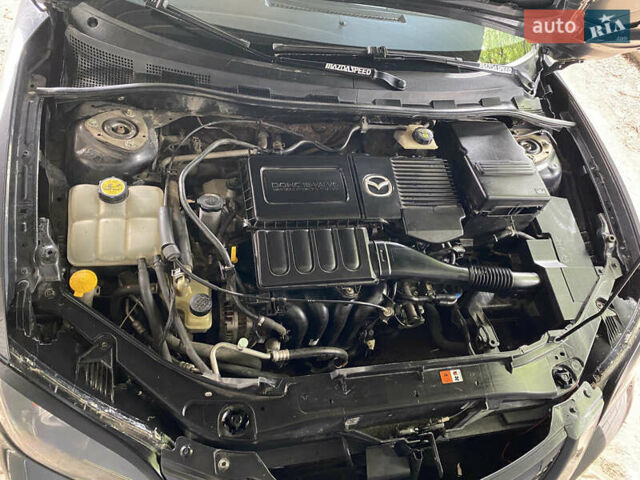 Черный Мазда 3, объемом двигателя 1.6 л и пробегом 176 тыс. км за 5699 $, фото 9 на Automoto.ua