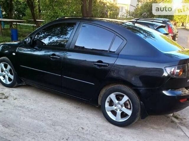 Чорний Мазда 3, об'ємом двигуна 2 л та пробігом 151 тис. км за 4800 $, фото 4 на Automoto.ua