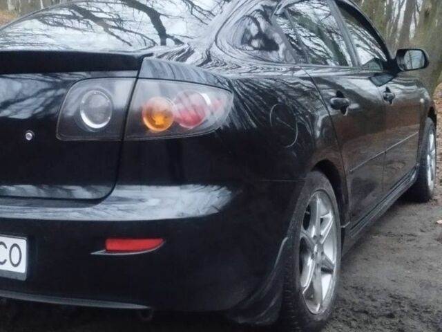 Черный Мазда 3, объемом двигателя 0 л и пробегом 243 тыс. км за 4200 $, фото 4 на Automoto.ua