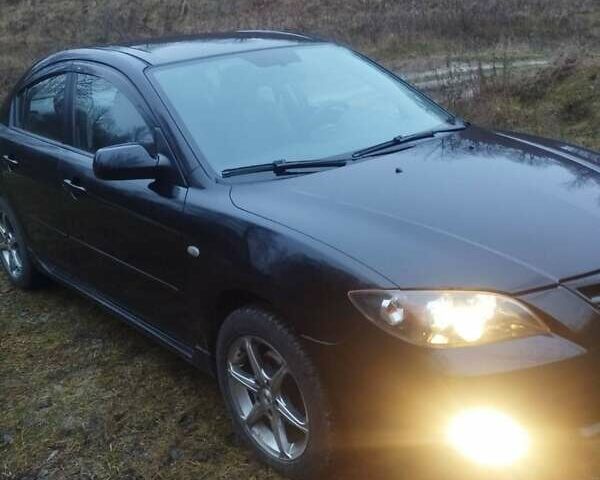 Черный Мазда 3, объемом двигателя 1.6 л и пробегом 243 тыс. км за 4499 $, фото 5 на Automoto.ua