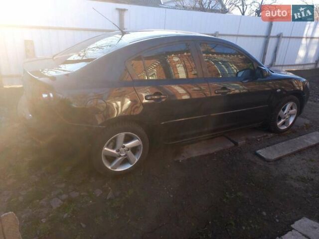 Чорний Мазда 3, об'ємом двигуна 1.6 л та пробігом 195 тис. км за 4300 $, фото 5 на Automoto.ua