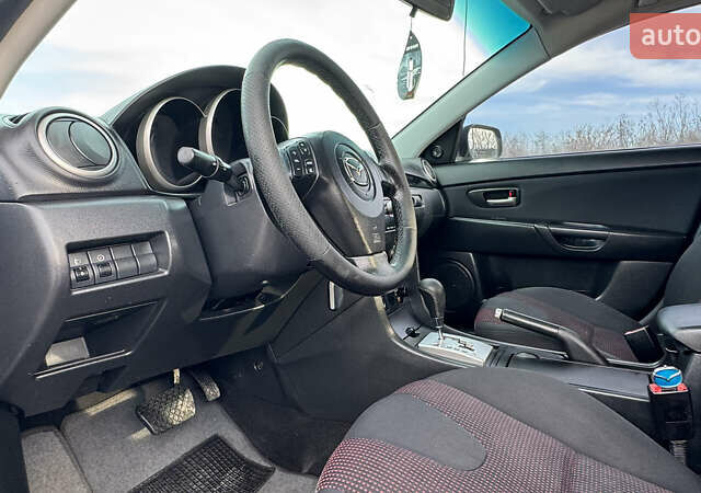 Чорний Мазда 3, об'ємом двигуна 1.6 л та пробігом 237 тис. км за 5850 $, фото 36 на Automoto.ua