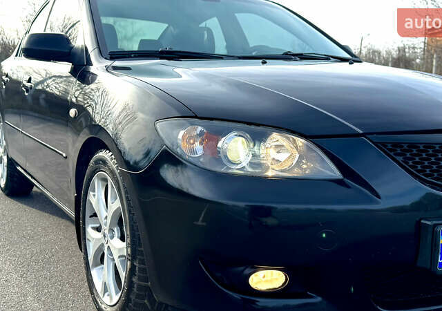 Чорний Мазда 3, об'ємом двигуна 1.6 л та пробігом 237 тис. км за 5850 $, фото 14 на Automoto.ua