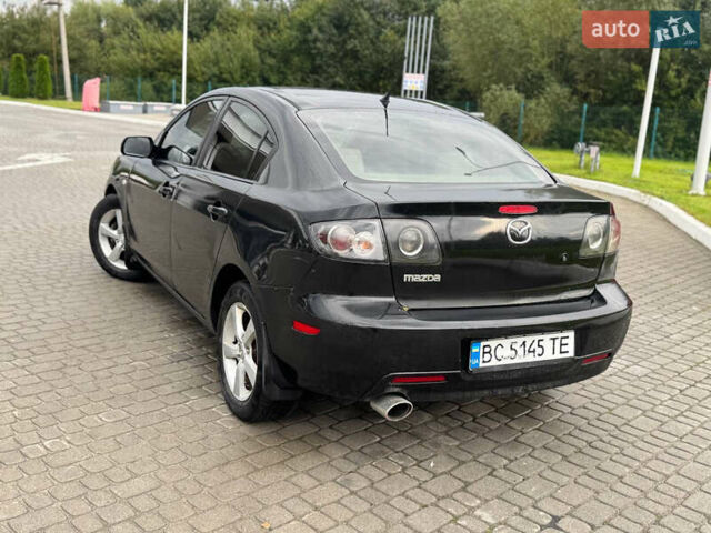 Чорний Мазда 3, об'ємом двигуна 1.6 л та пробігом 231 тис. км за 3650 $, фото 8 на Automoto.ua