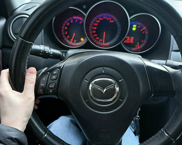 Черный Мазда 3, объемом двигателя 2 л и пробегом 260 тыс. км за 4950 $, фото 16 на Automoto.ua