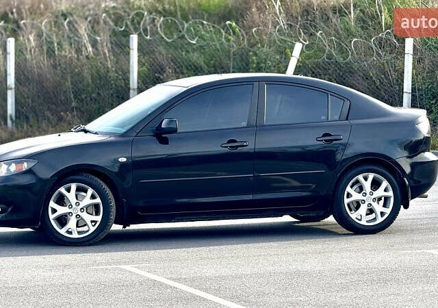 Чорний Мазда 3, об'ємом двигуна 1.6 л та пробігом 237 тис. км за 5850 $, фото 19 на Automoto.ua