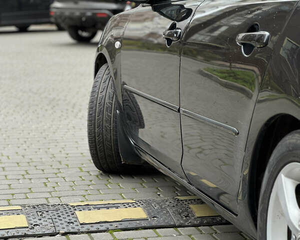 Черный Мазда 3, объемом двигателя 1.6 л и пробегом 192 тыс. км за 5500 $, фото 21 на Automoto.ua