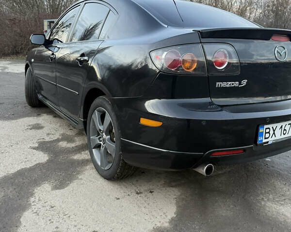 Черный Мазда 3, объемом двигателя 2 л и пробегом 260 тыс. км за 4950 $, фото 3 на Automoto.ua