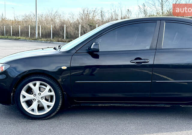 Чорний Мазда 3, об'ємом двигуна 1.6 л та пробігом 237 тис. км за 5850 $, фото 18 на Automoto.ua